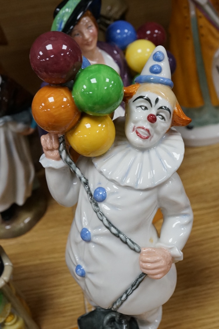 A collection of Royal Doulton figures to include The Old Balloon Seller, Doctor, Votes for Women and The Detective